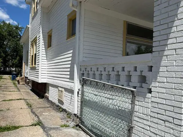 12013 Gay Ave — side view