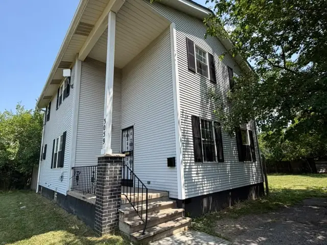 3059 E 73rd St — side view and entrance